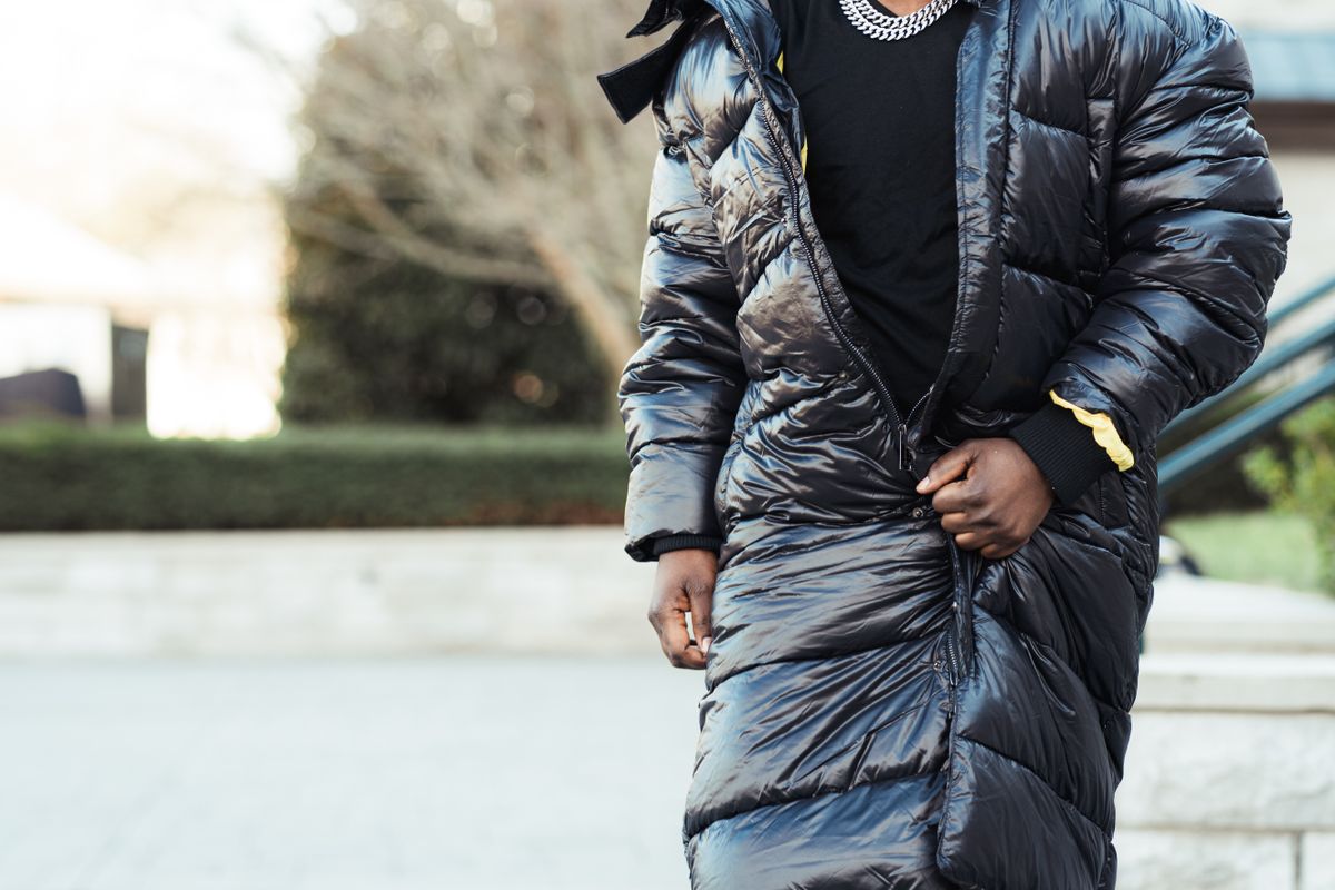 Close view of quilted jacket baffles with insulation visible through the fabric