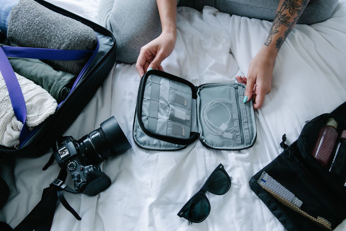 Packing cubes arranged inside an open suitcase